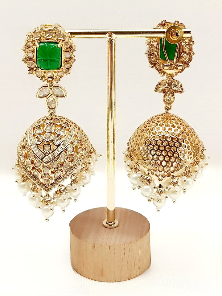  Traditional Kundan earrings with American diamond setting and intricate green stones