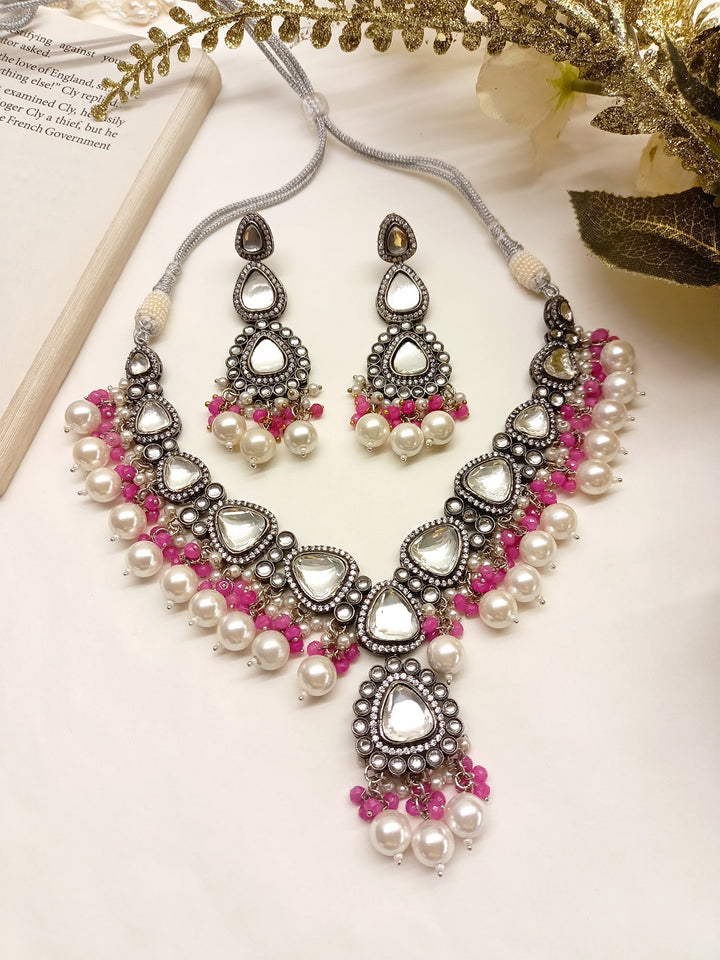 Exquisite Poornima Pink Kundan Necklace Set with intricate detailing and elegant design