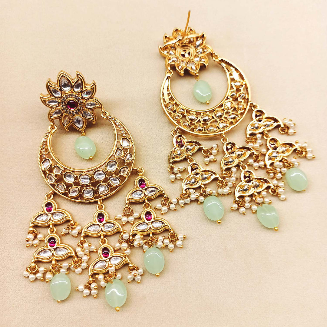 Exquisite and luxurious Kundan earrings in rose pink and mint green with small pearl beads and mint green oval stones hangings