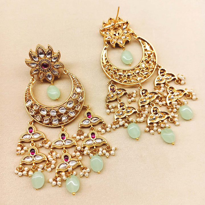Exquisite and luxurious Kundan earrings in rose pink and mint green with small pearl beads and mint green oval stones hangings