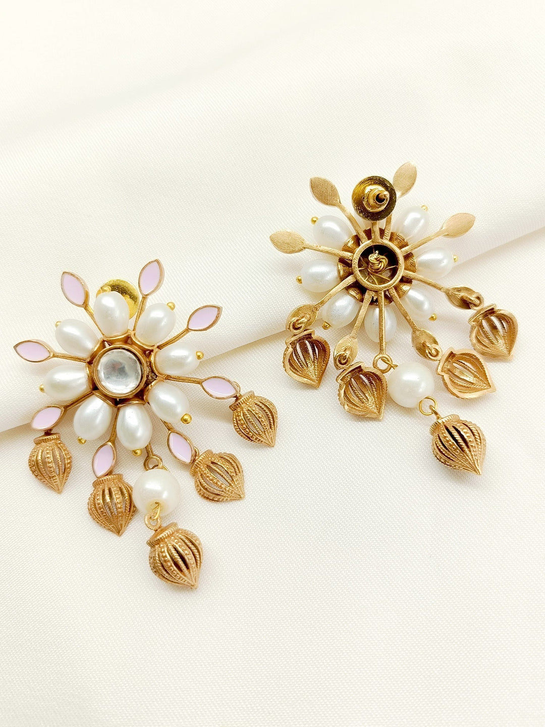  Upgrade your wardrobe with Jahzara White Boutique Tops, crafted with antique gold plated brass metal and traditional boutique styling for a unique and stylish look