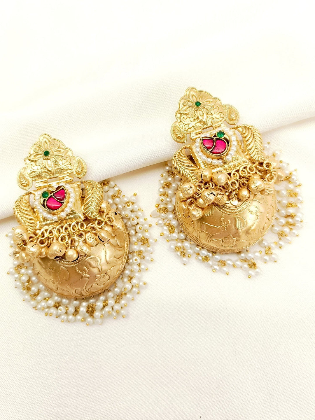 Gold plated brass metal jhumki with traditional designs and pearl hangings 