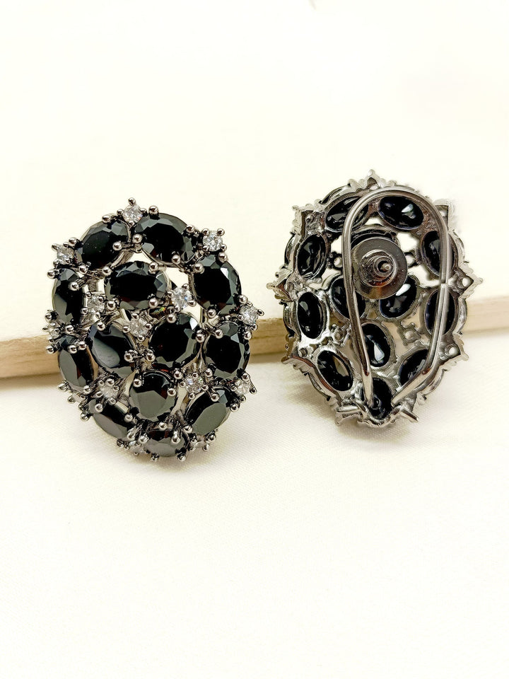  Timeless and versatile earrings made from rhodium plated brass metal, featuring stunning American diamond stones for a touch of luxury