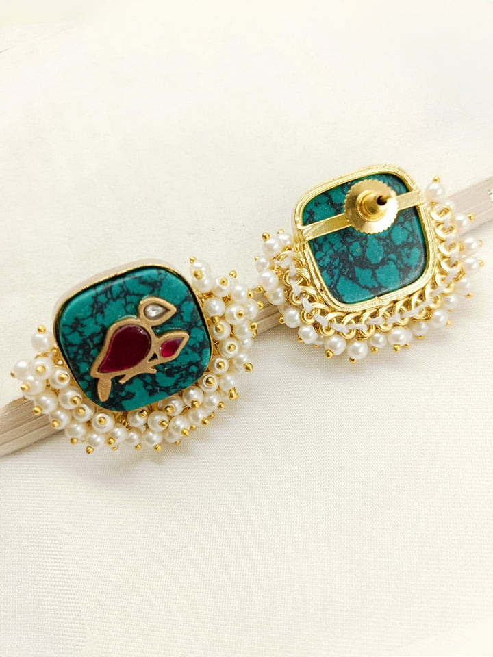 Traditional and stylish boutique top crafted from gold plated brass metal with intricate pearl detailing and bird motifs