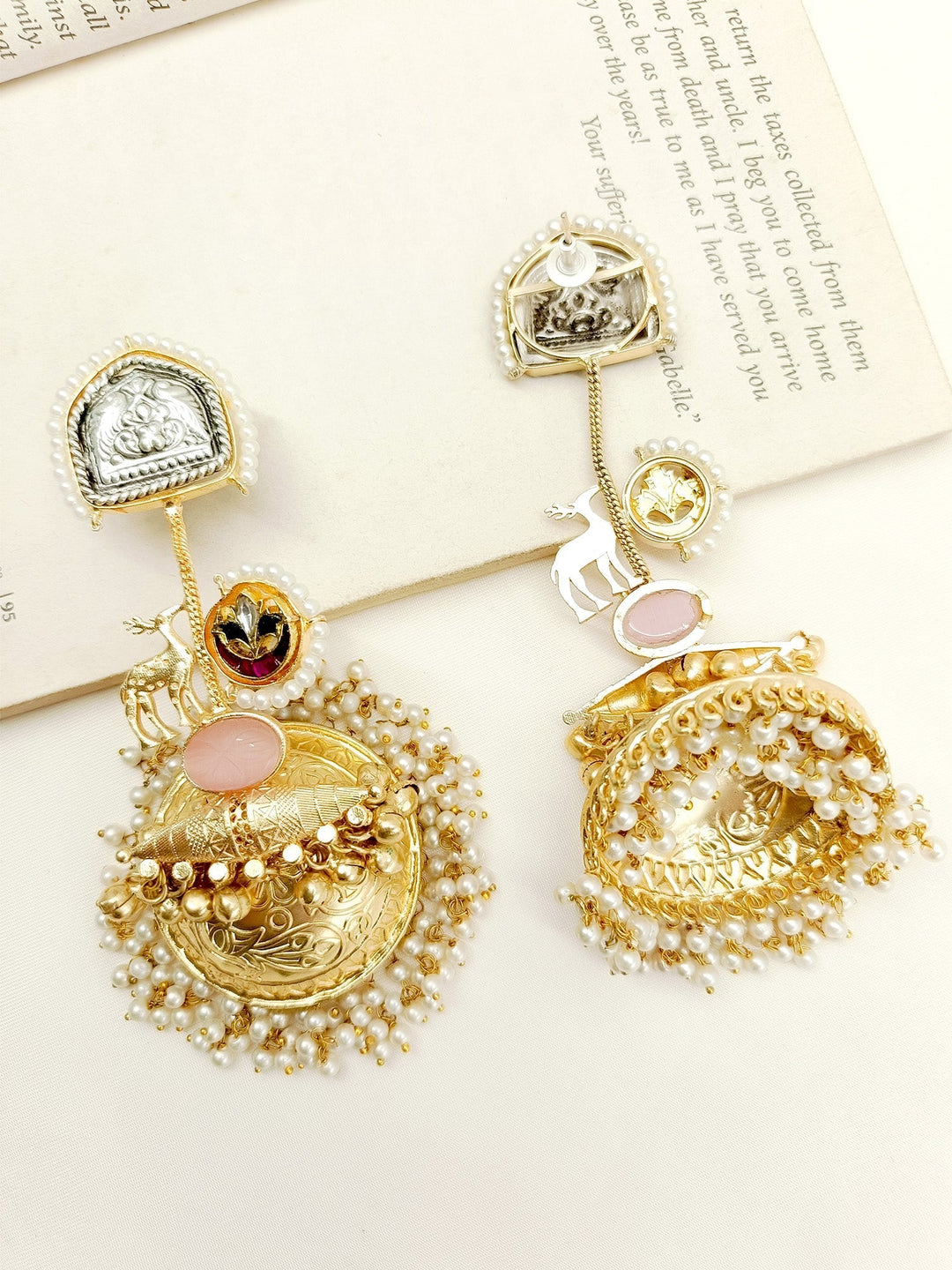 Elevate your style with our Aakanksha Multi Colour Boutique Jhumki, crafted with traditional techniques and gold plated brass metal