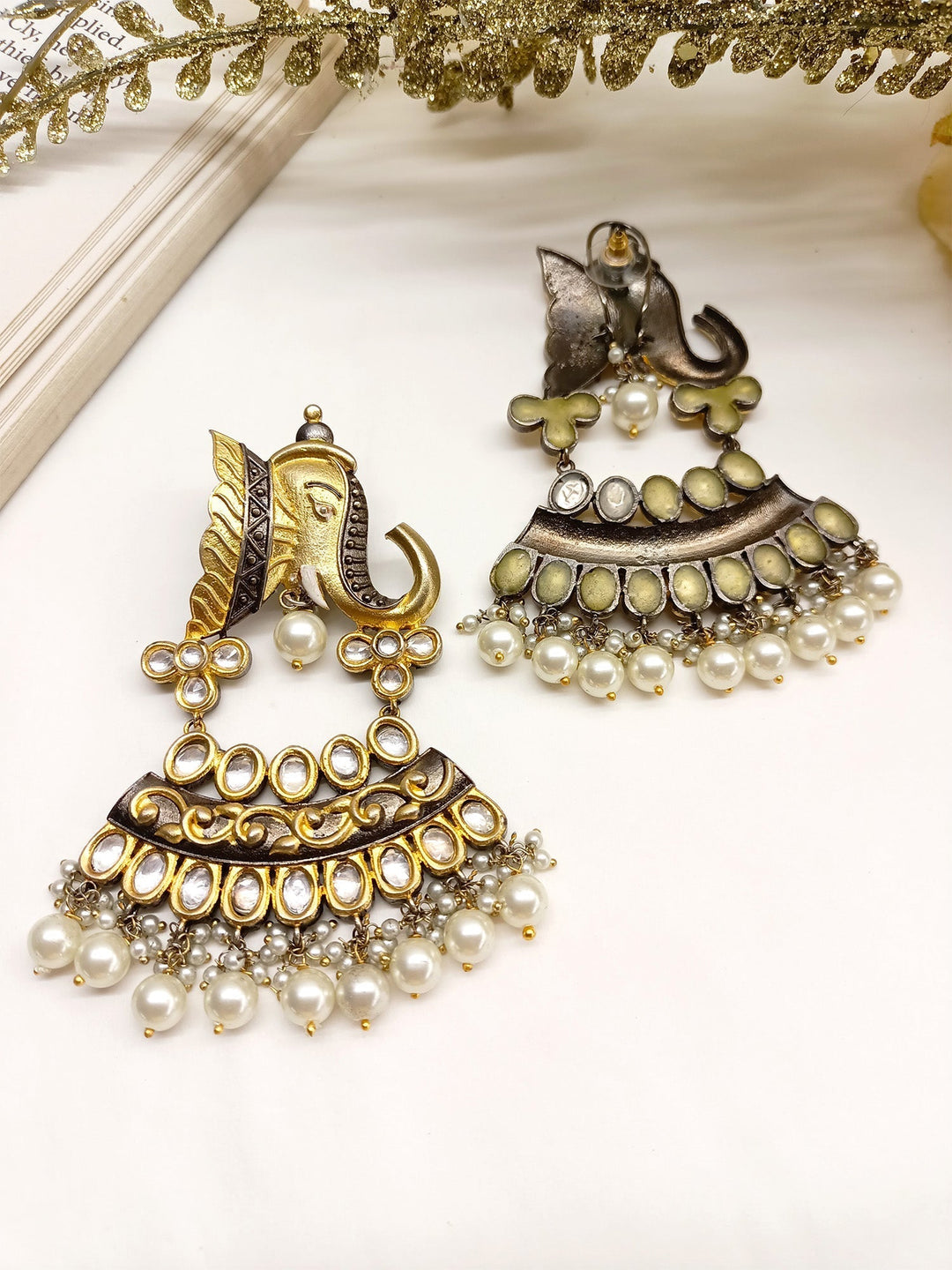 Exquisite Kamalika Elephant Kundan Earrings with intricate gold detailing and colorful gemstones