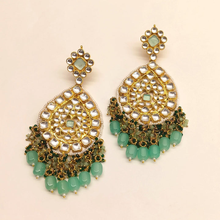 Gold plated pendant set with mint green stone and Pachi Kundan design