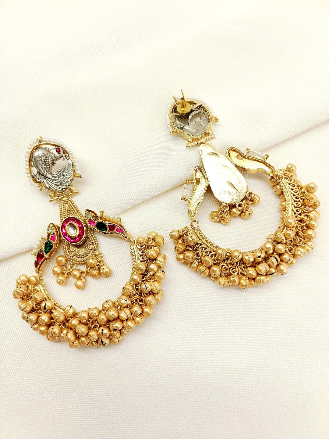  Traditional and elegant peacock earrings from Hina R & G Boutique 