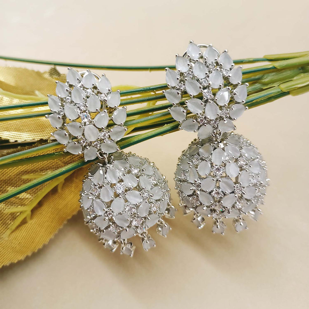  Elegant Jigna Light Grey Silver Plated Jhumkas with American Diamond And Pear Shape Stone