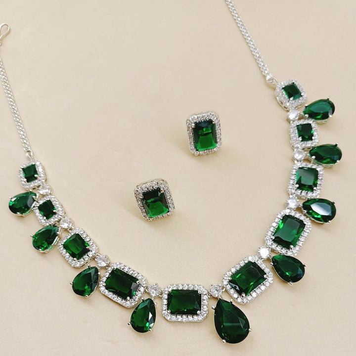  Luxurious necklace and tops adorned with green emerald and American diamond stones 