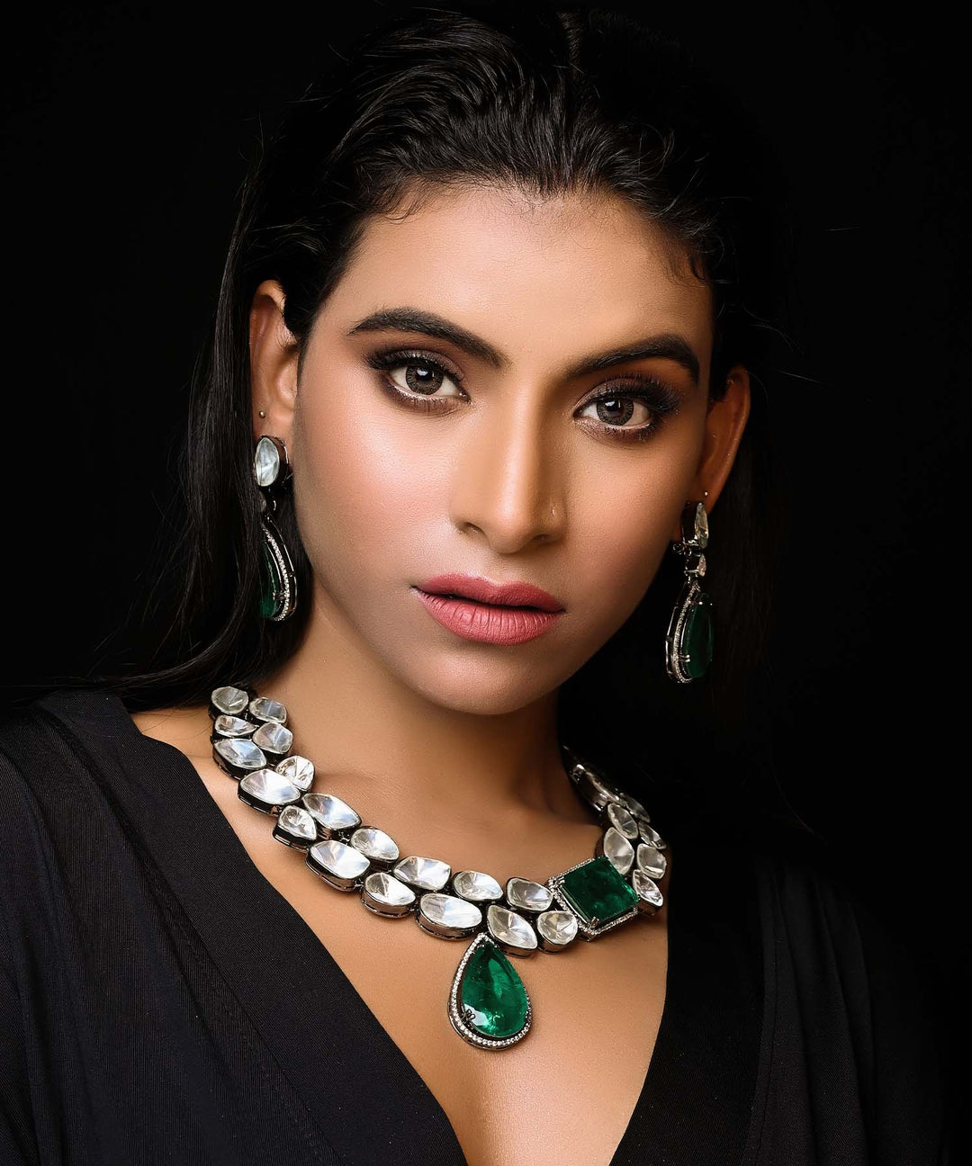 Two layered uncut diamond polki long set with emerald doublet stone on brass metal with Victorian black polish 