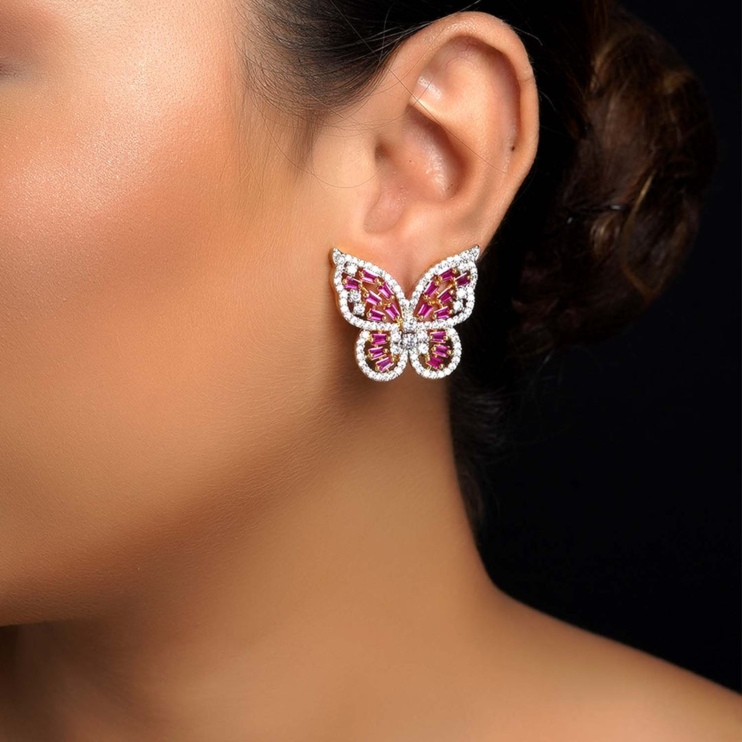 Gold plated tops with magenta diamond work for a luxurious look