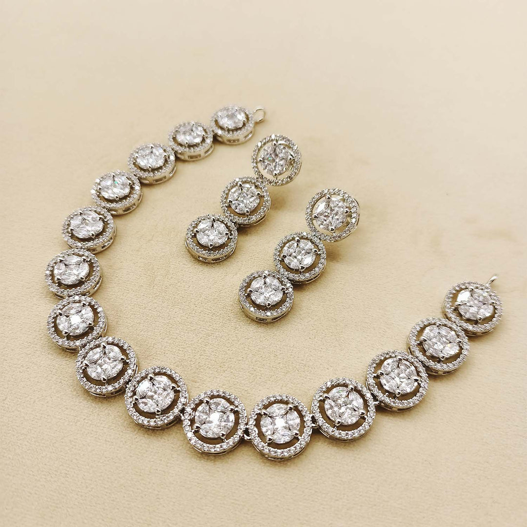 Gorgeous silver plated necklace set featuring beautiful American diamond pressure setting