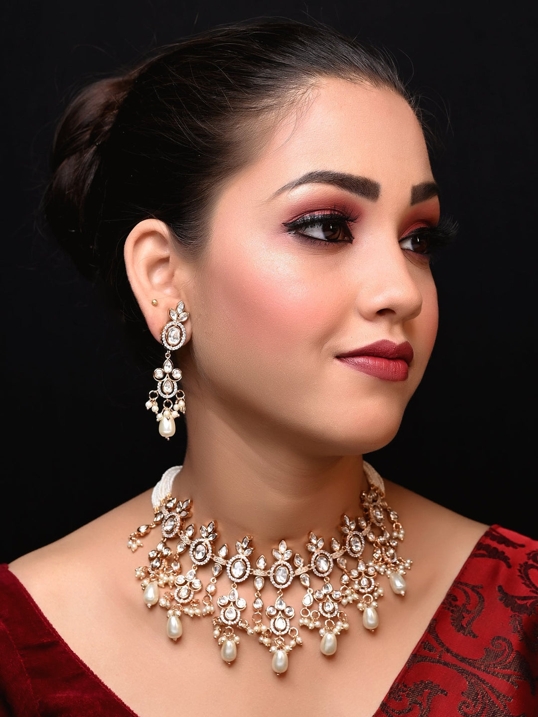 Rubi White Rose Gold Plated Kundan Choker with intricate floral design and sparkling gemstones