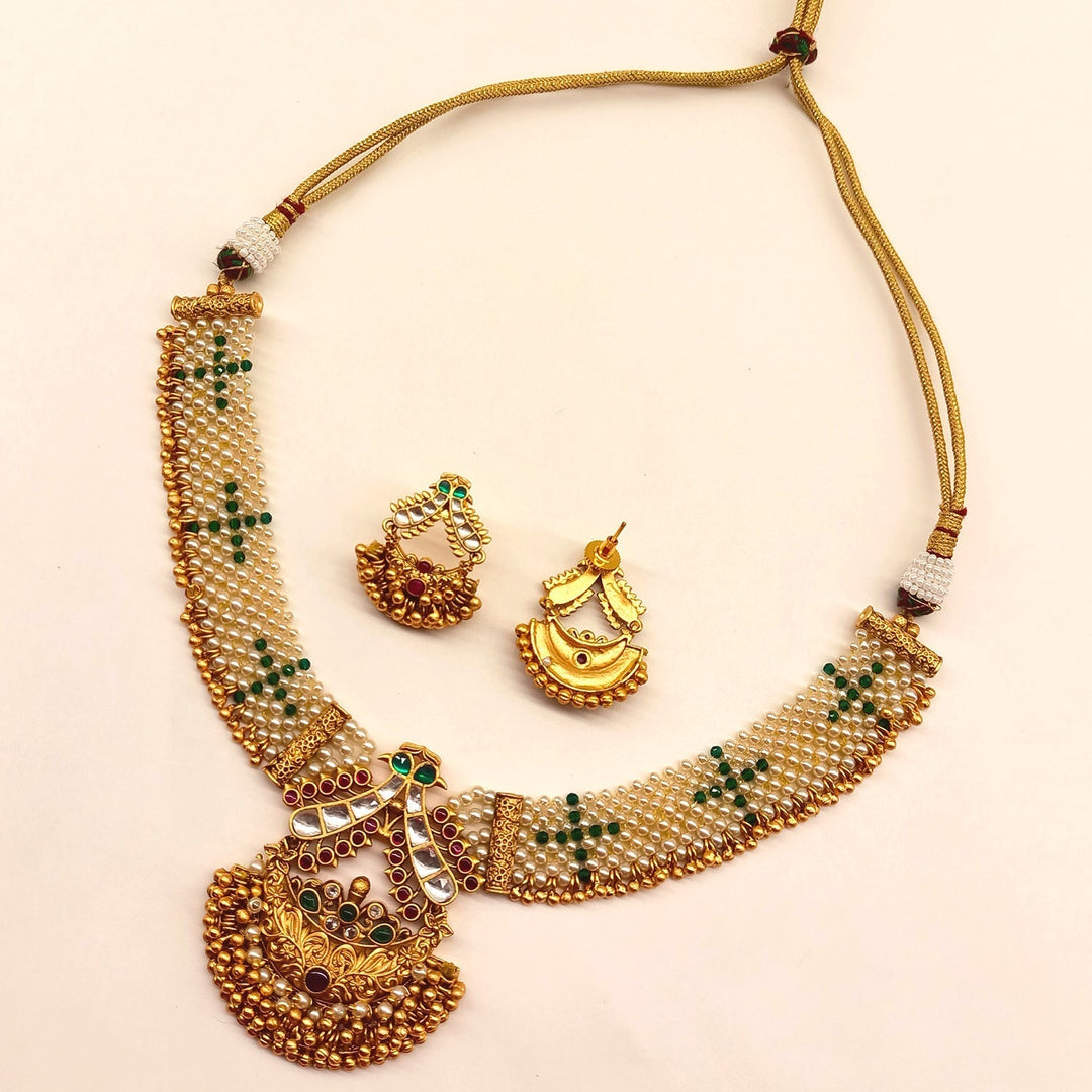 Gorgeous Indian design earrings in the Adrika Rose Pink & Green Stone Temple Work Gold Plated Antique Set