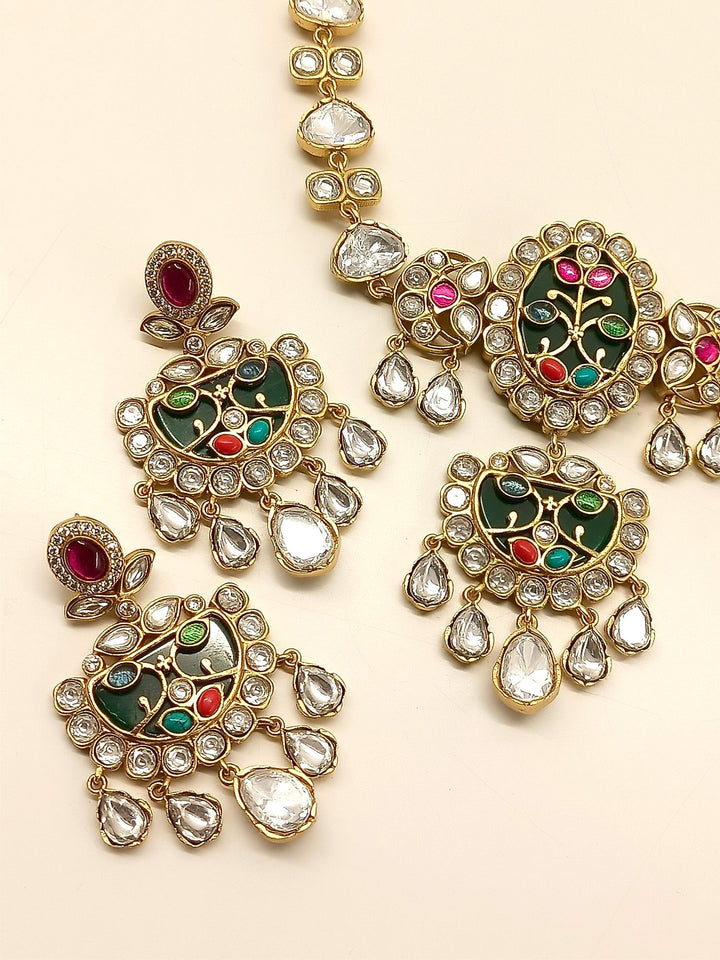 Gorgeous choker set with gold plated brass metal, polki, and natural pearl for a traditional and stunning look