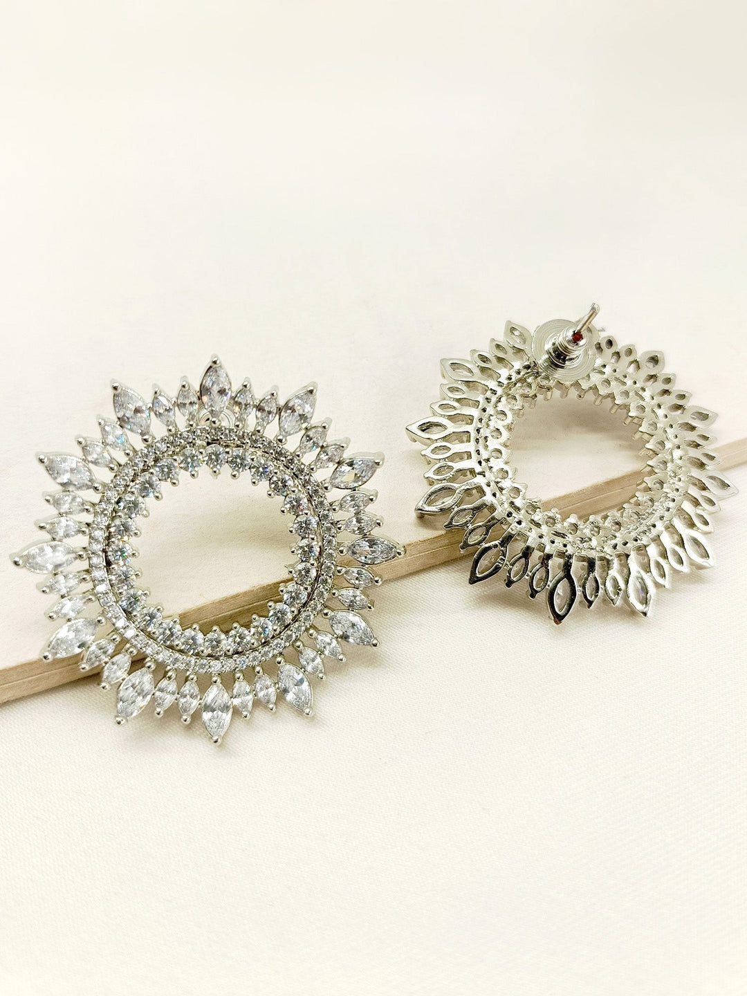  Elegant and intricately designed Dhruvika Diamond Work Silver Plated Tops featuring sparkling American diamonds and marquise round jewels 