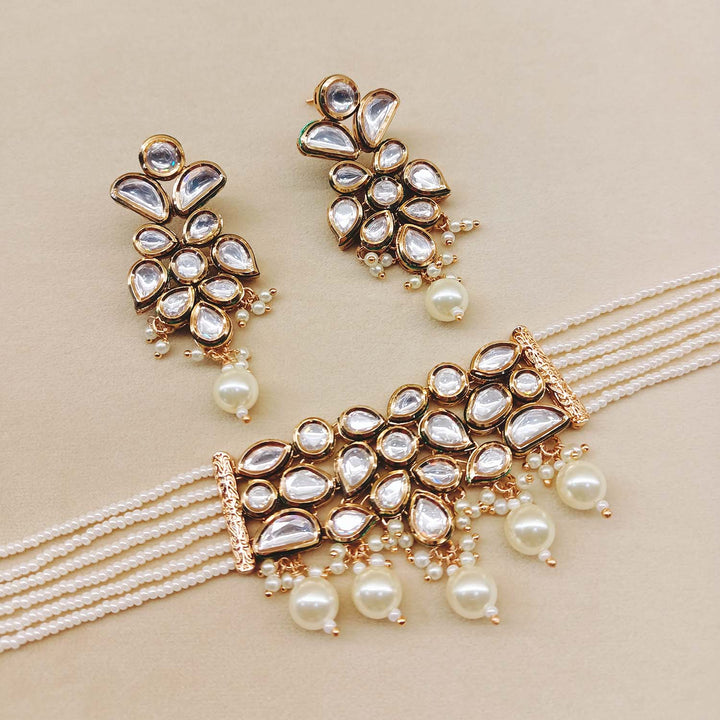 Gorgeous Kundan choker with white pearls and delicate drop shape white pearl earrings