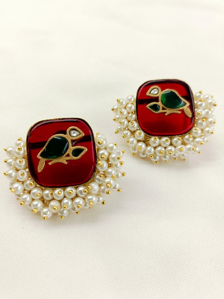 Elegant and stylish boutique top adorned with gold plated brass metal and pearl detailing