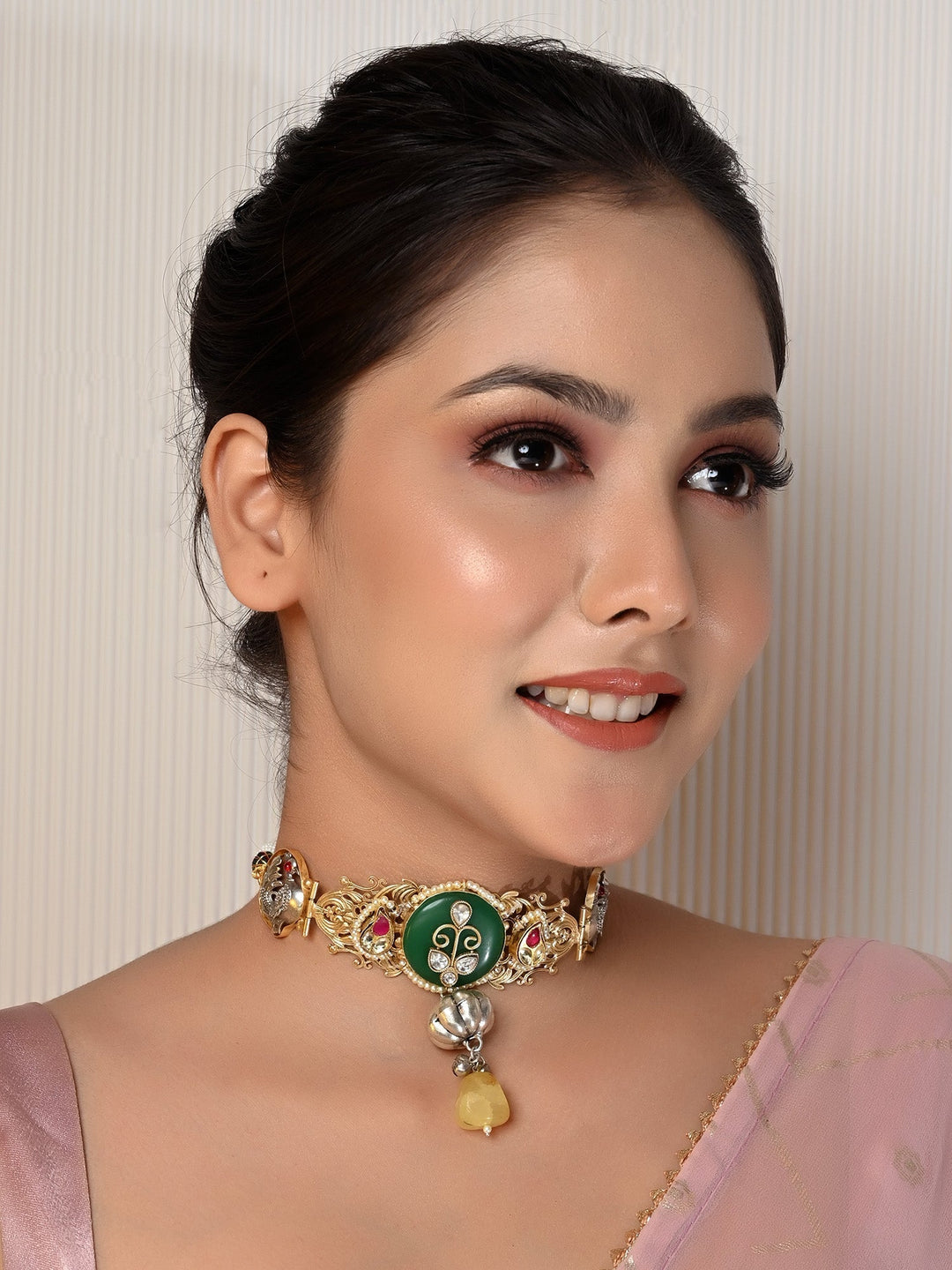 Handcrafted black velvet choker with gold and gemstone embellishments