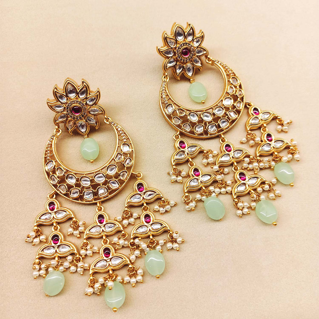 Stunning rose pink and mint green Kundan earrings with gold plated brass metal and small pearl beads