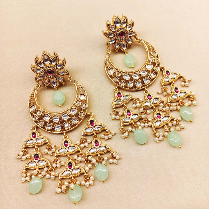 Stunning rose pink and mint green Kundan earrings with gold plated brass metal and small pearl beads
