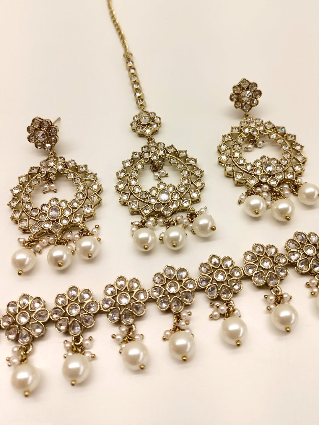 Anokhi White Polki Necklace Set with intricate design and sparkling stones