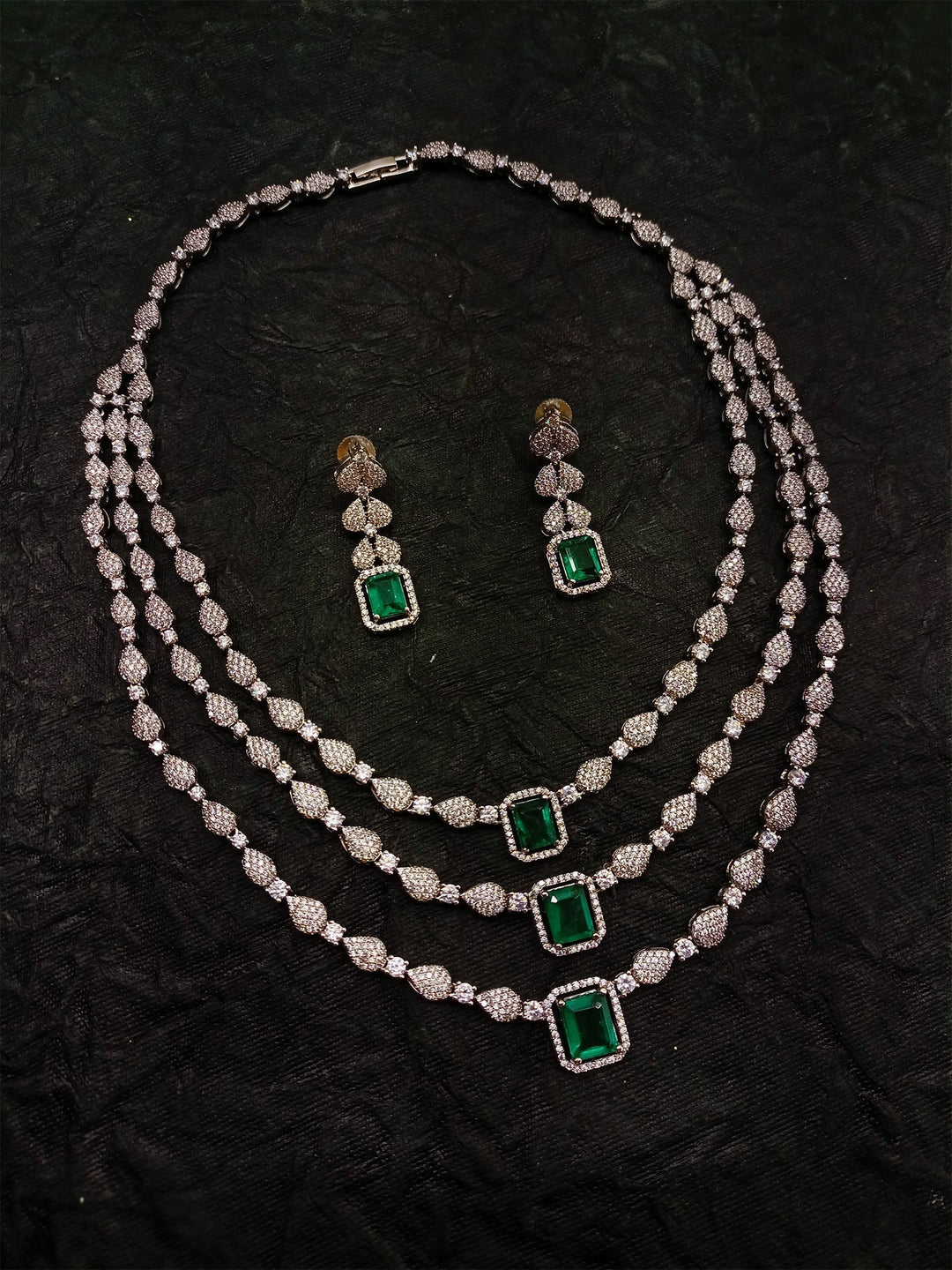  American diamond necklace set with semi precious emerald stone and small earrings