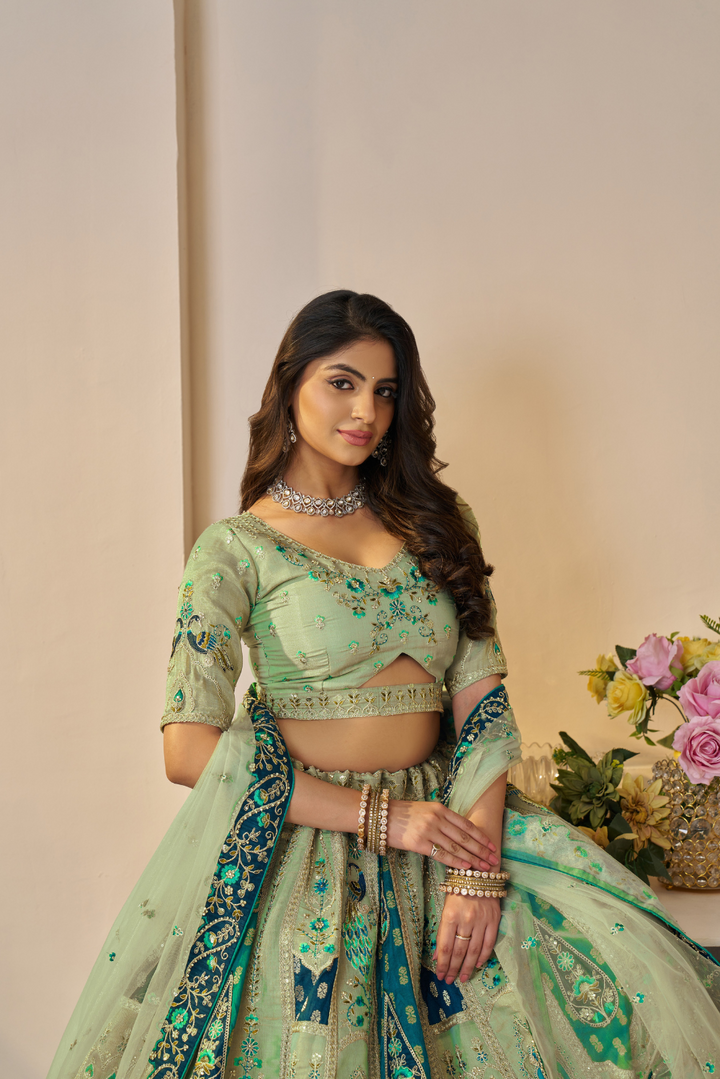 Rajsi Haathi Collection: Green Peacock-Embroidered Bridal Lehenga - qivii