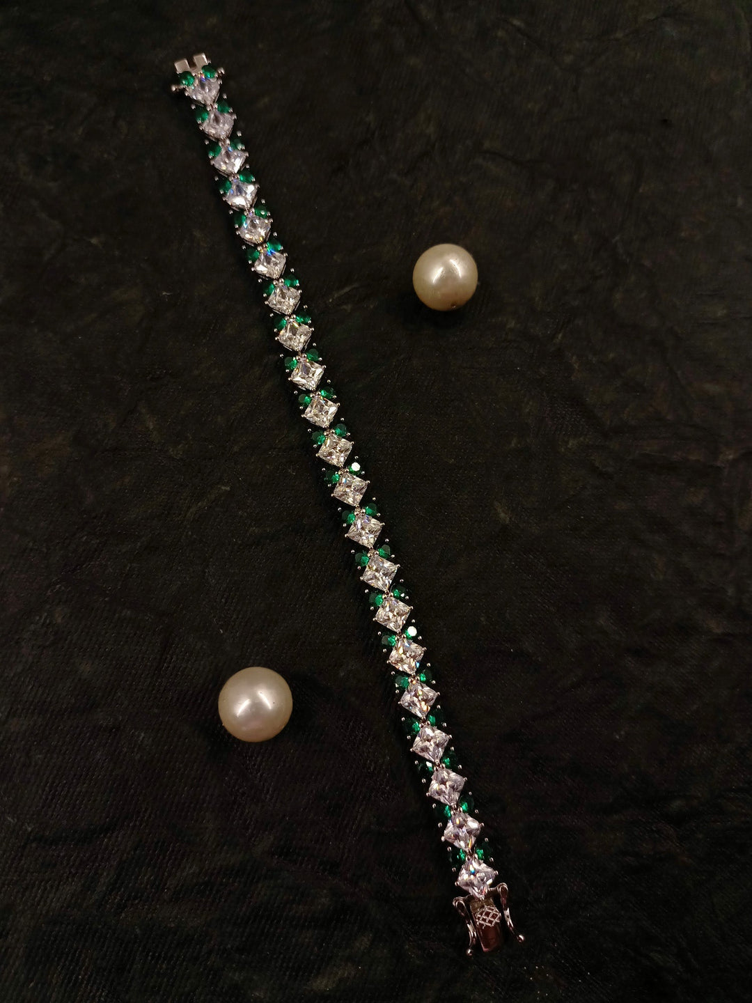 Fluid Emerald American Diamond Bracelet - qivii