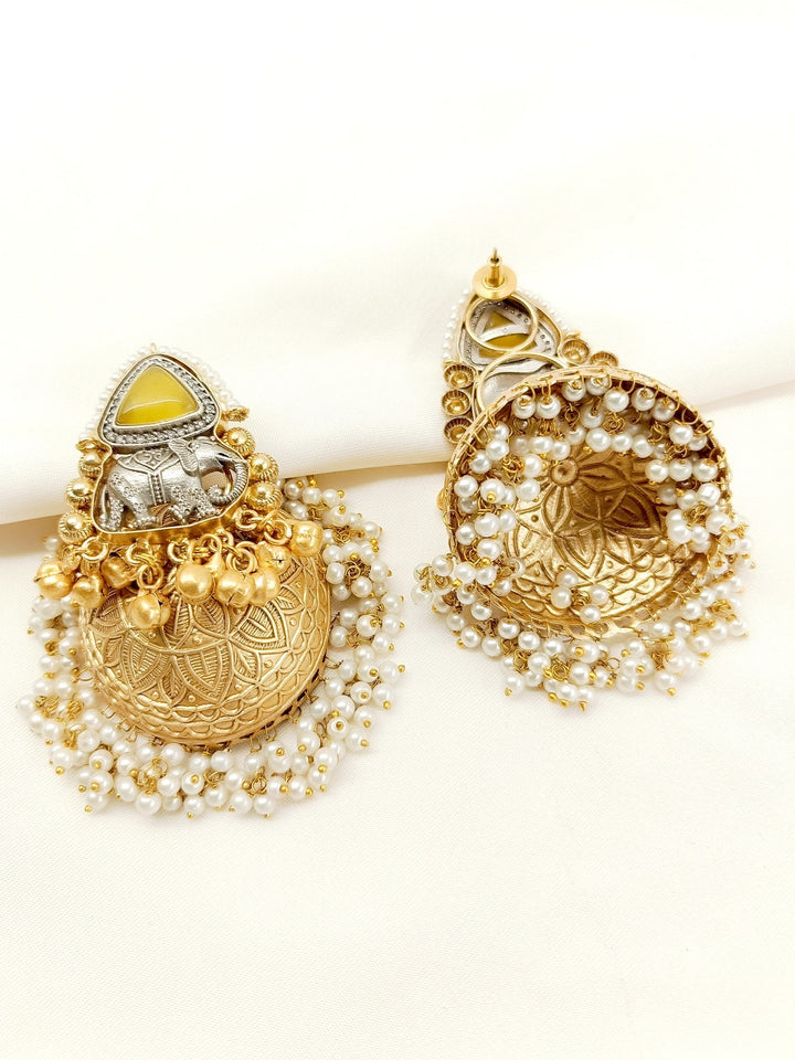  Elegant and delicate yellow boutique jhumkis with pearl adornments 