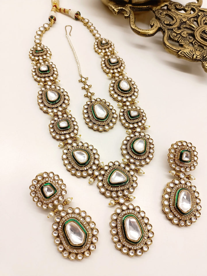  Traditional Kundan set with beautiful pearls and American diamond setting, designed to shine and sparkle for years to come, a perfect decoration for bridal wear