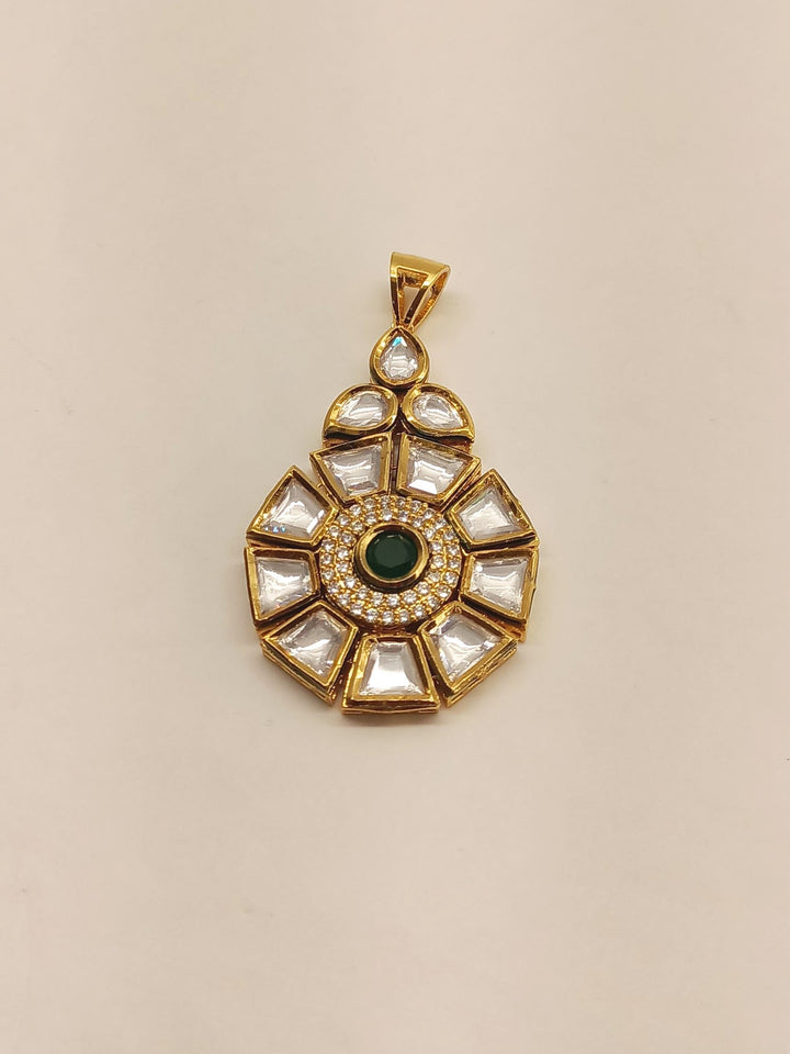 Handcrafted green Kundan pendant set with intricate details and stunning design