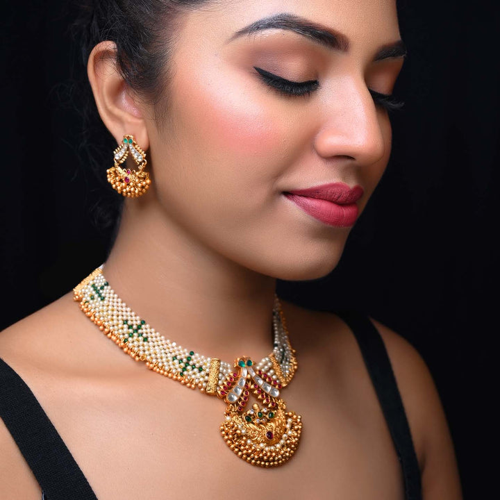 Adrika Rose Pink & Green Stone Temple Work Gold Plated Antique Set traditional real look alike golden texture and pearl work kundan stone necklace with gorgeous Indian design along with pretty earrings