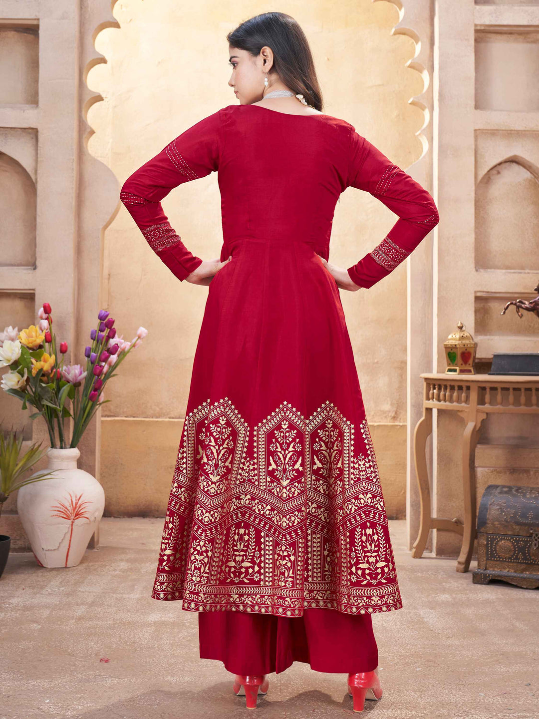 Matching palazzo and silk dupatta create a sophisticated, cohesive look