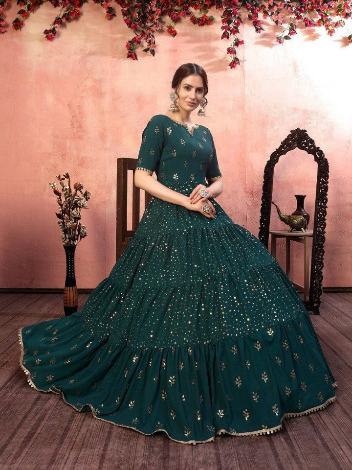  Beautiful green anarkali gown with fancy golden sequence work 