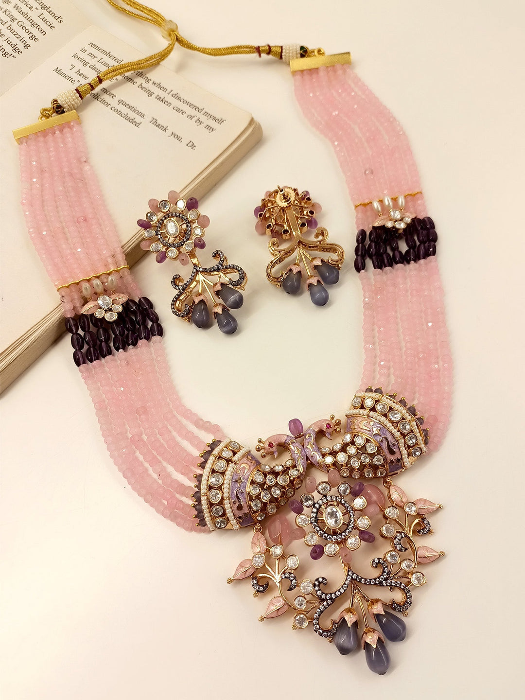  Timeless and luxurious Pink Kundan Necklace Set with peacock motifs and multiple layered beads chain crafted from gold plated brass metal