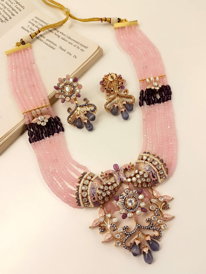  Timeless and luxurious Pink Kundan Necklace Set with peacock motifs and multiple layered beads chain crafted from gold plated brass metal