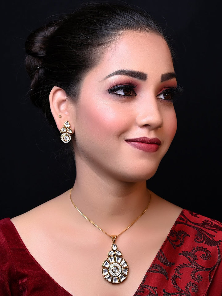 Beautiful Purnima White Kundan Pendant Set with intricate Kundan setting and brass metal base with gold plating