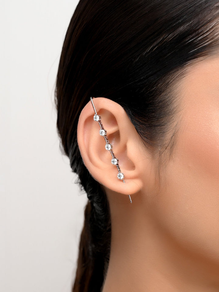 Maushmi White American Diamond Earcuff crafted from silver plated brass metal, exuding elegance and sophistication