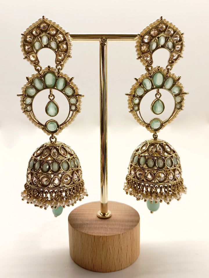 Stunning Marlee Mint Green Polki Jhumki earrings with antique gold plated brass metal and gorgeous pearl hanging