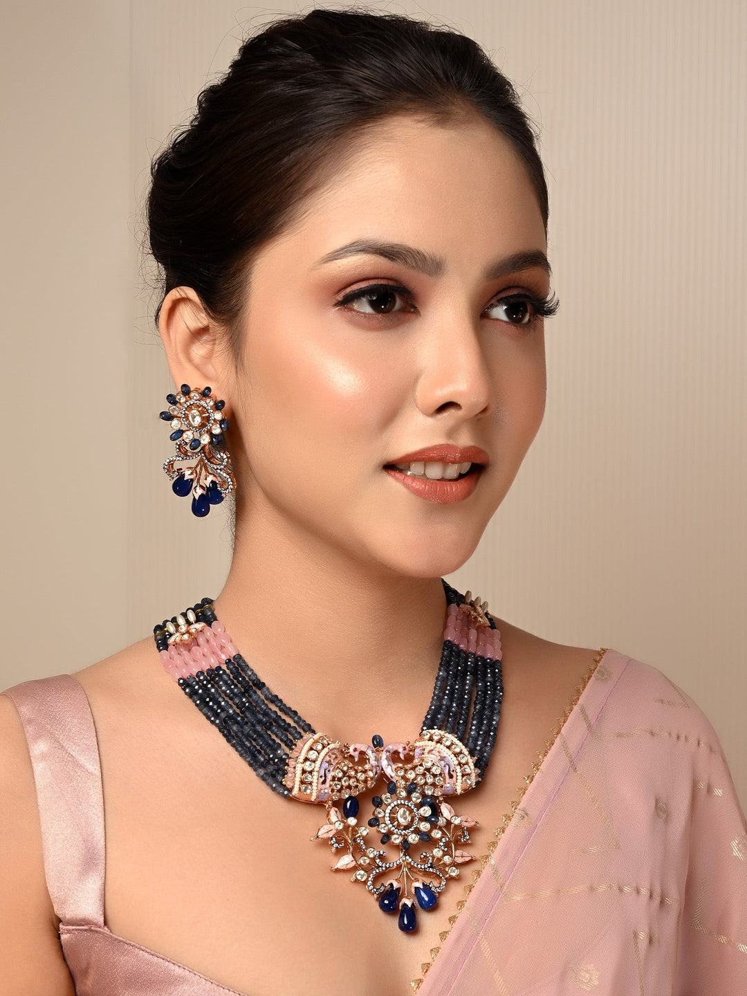 Gold plated brass metal Kundan necklace set with peacock motifs 