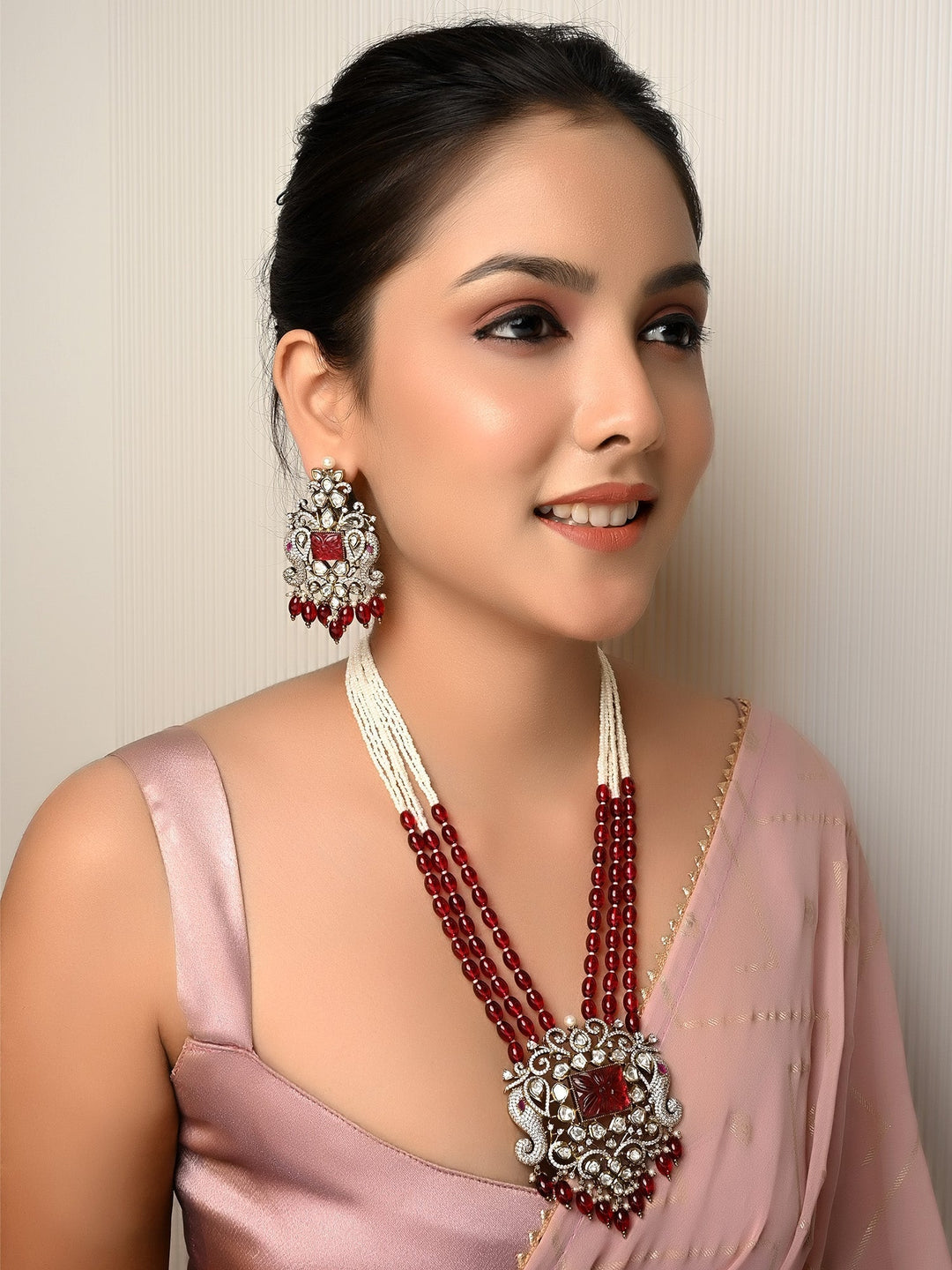 Sayesha Maroon Kundan Polki Long Necklace Set crafted from antique gold plated brass metal with traditional Indian Kundan Polki and sparkling American diamonds setting 