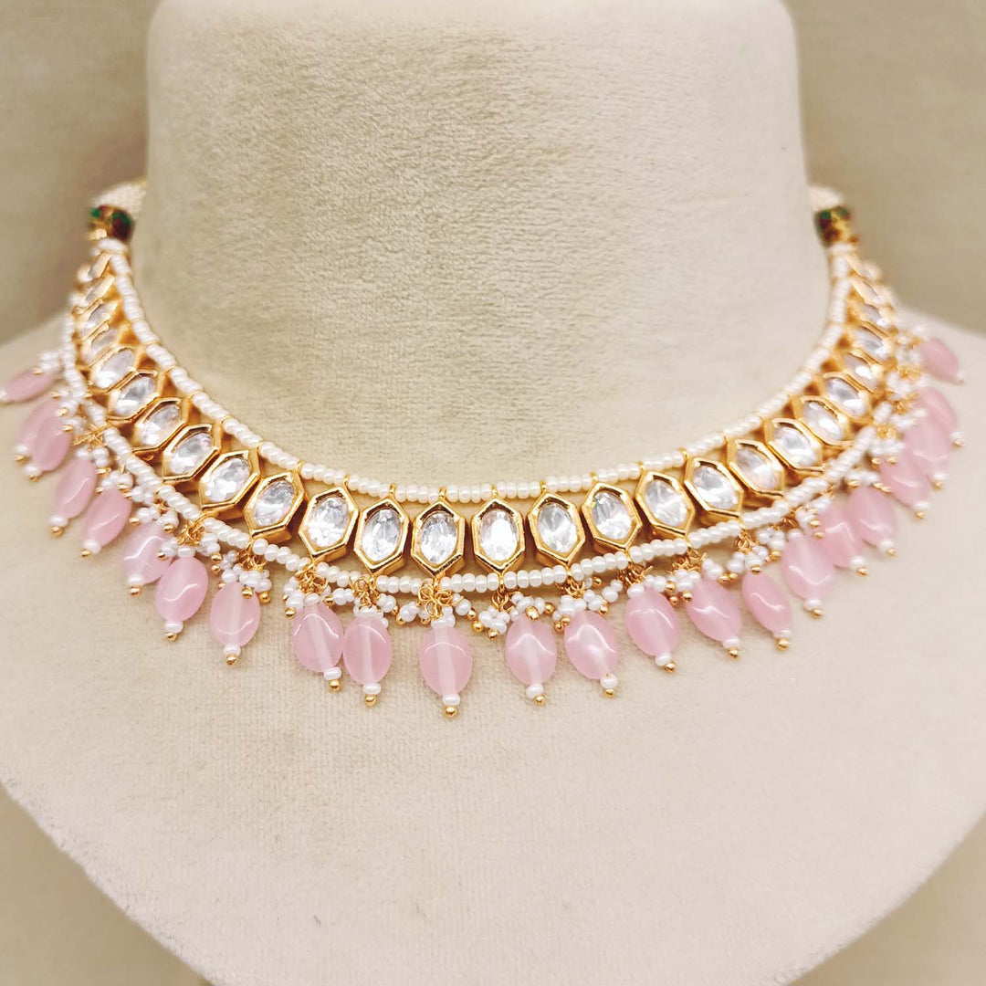  Gold plated brass metal Kundan set with pink stones hangings and long danglers 