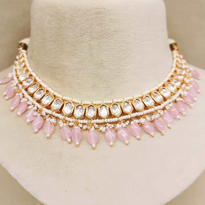  Gold plated brass metal Kundan set with pink stones hangings and long danglers 