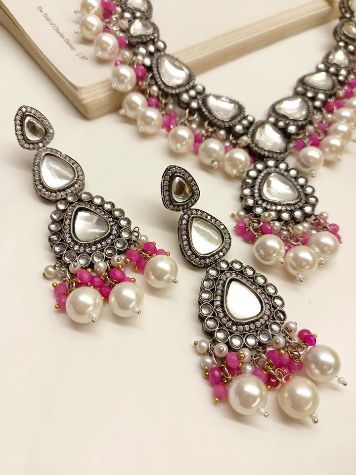 Exquisite Poornima Pink Kundan Necklace Set with intricate detailing and elegant design