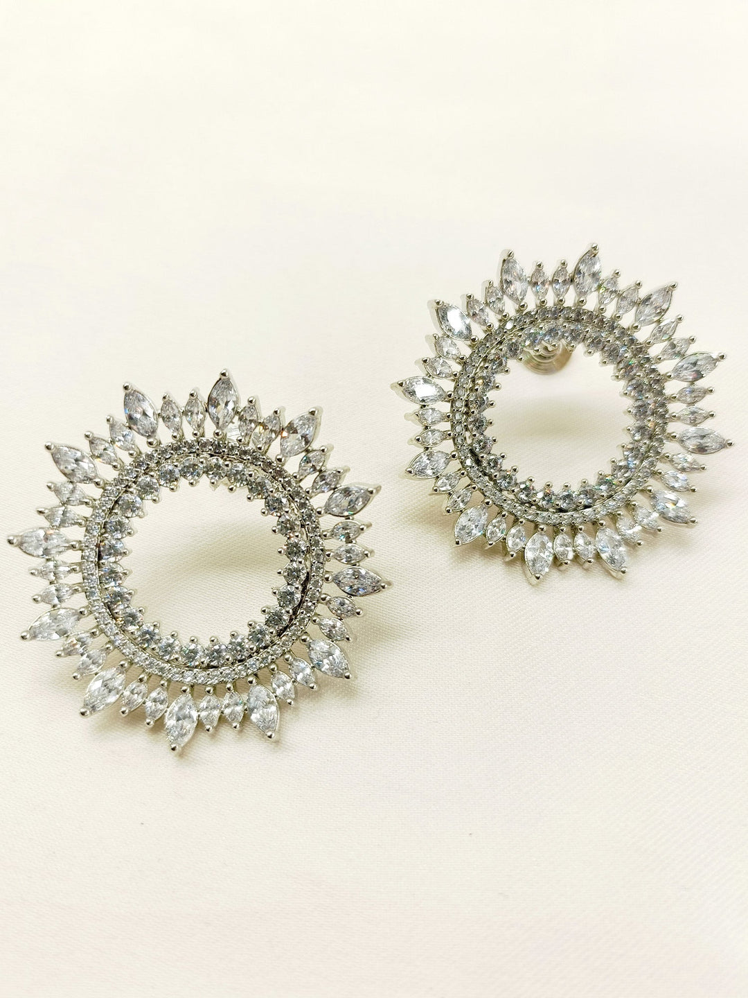  Stunning silver plated tops with Dhruvika diamond work, showcasing exquisite American diamond and marquise round designs