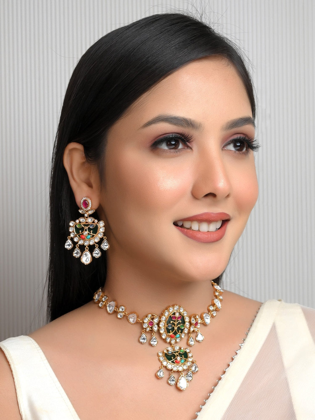 Yessa Multi Colour Boutique Choker Set crafted with gold plated brass metal with a polki and natural pearl for a stunning look