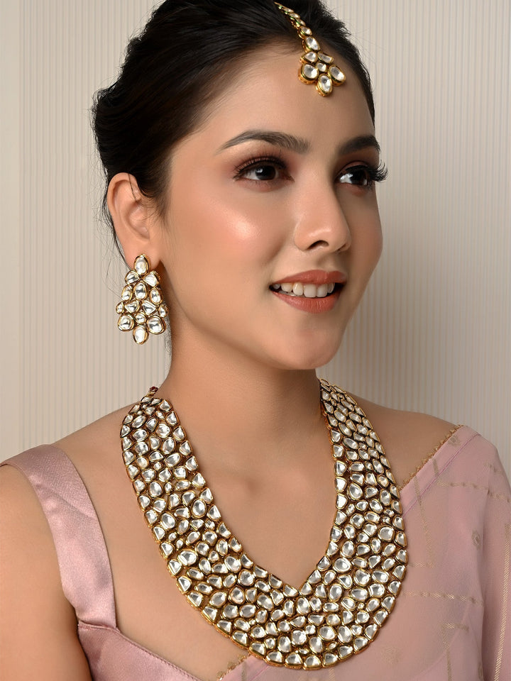 Exquisite gold and green Sanober Kundan Necklace Set with intricate detailing