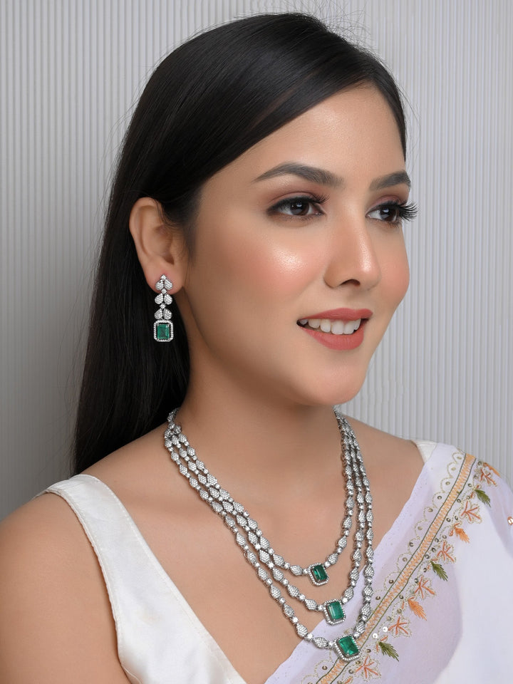 Silver Plated American Diamond Necklace Set With Semi Precious Emerald Stone Based On Brass Metal
